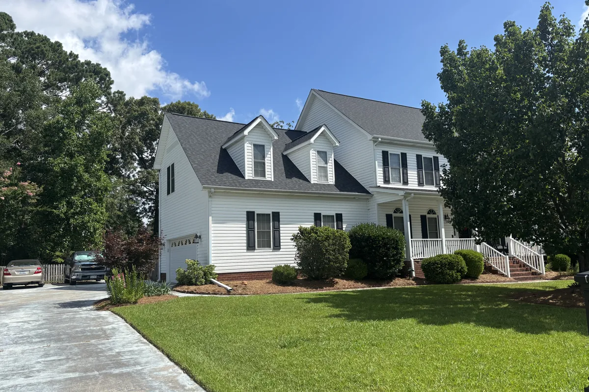 Completed roof on a two-storey home with dormers